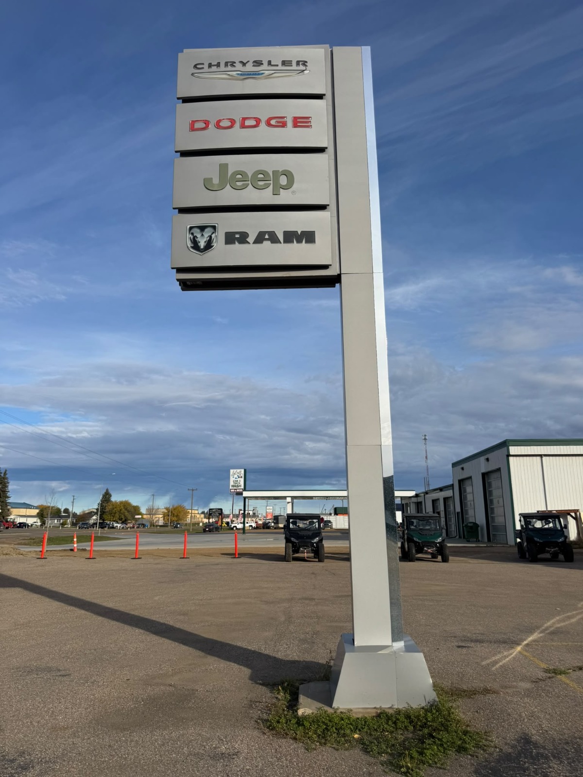 Borderlands Chrysler La Crete entrance with ATVs and side-by-sides on display