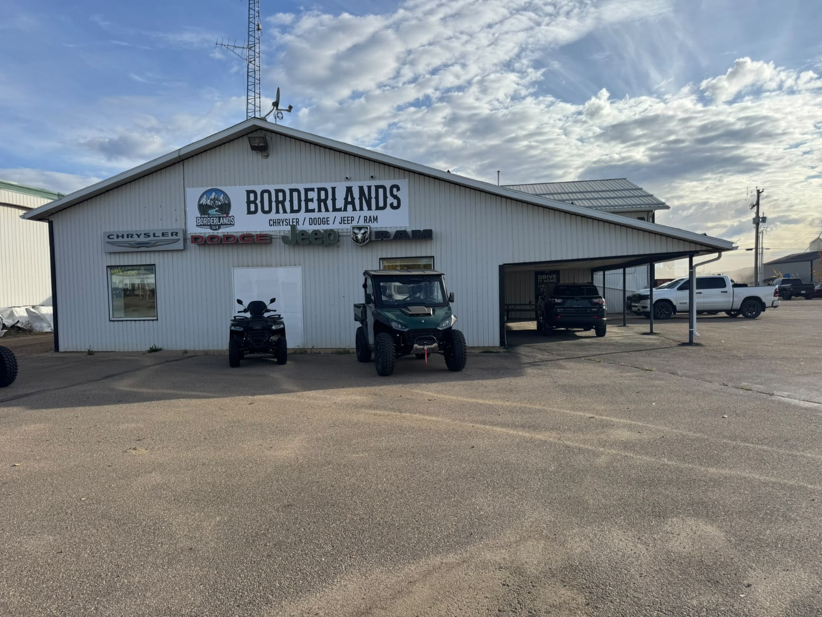 Chrysler, Dodge, Jeep and Ram roadside sign at Borderlands in La Crete